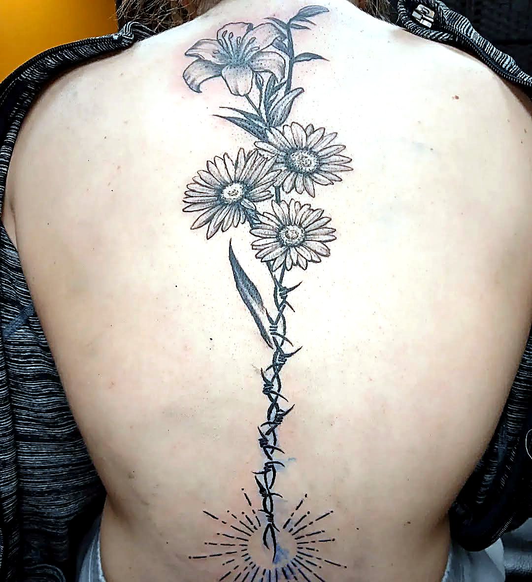Floral Spine tattoo — House of Jackalope, Mansfield OH