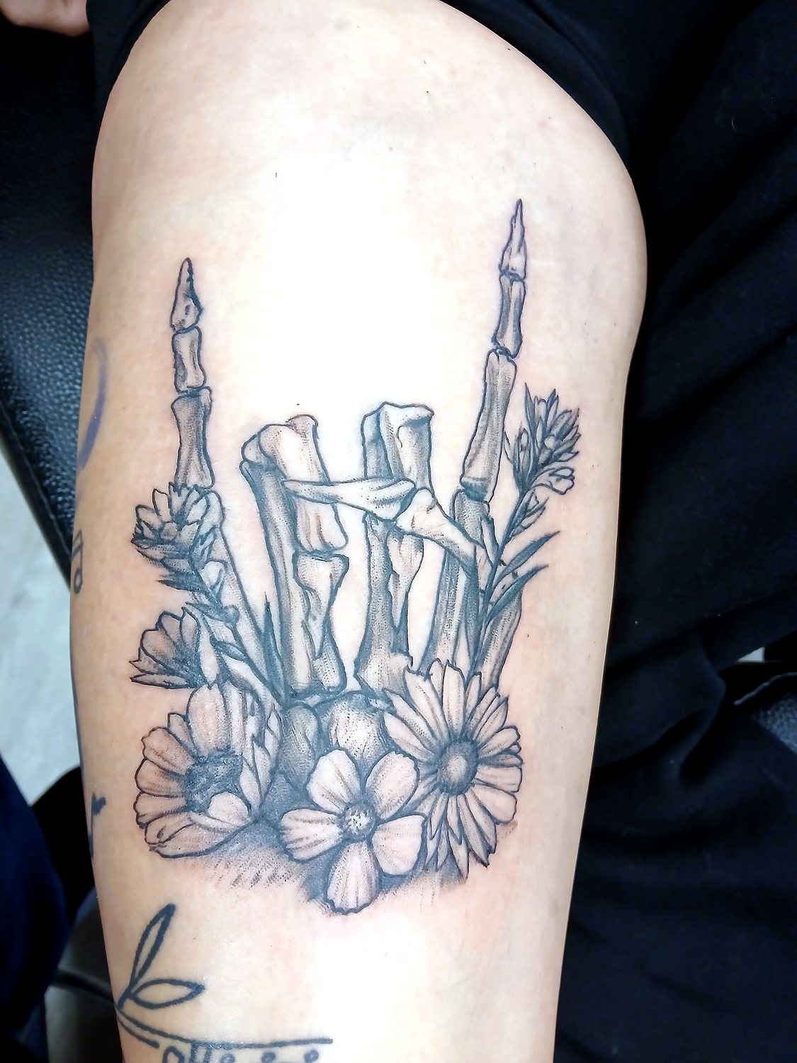 Hand & Wildflowers tattoo — House of Jackalope, Mansfield OH