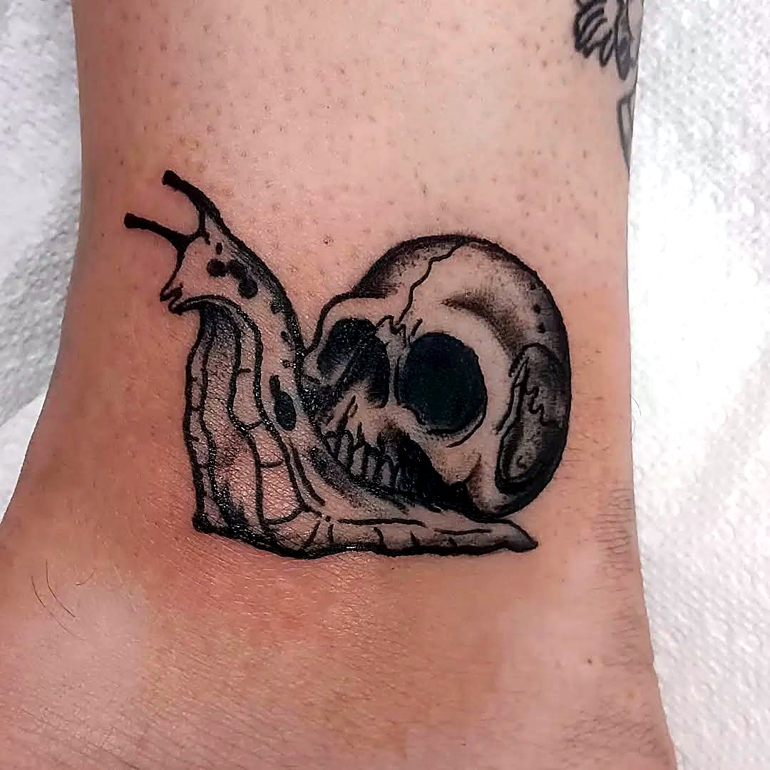 Snail & Skull tattoo — House of Jackalope, Mansfield OH