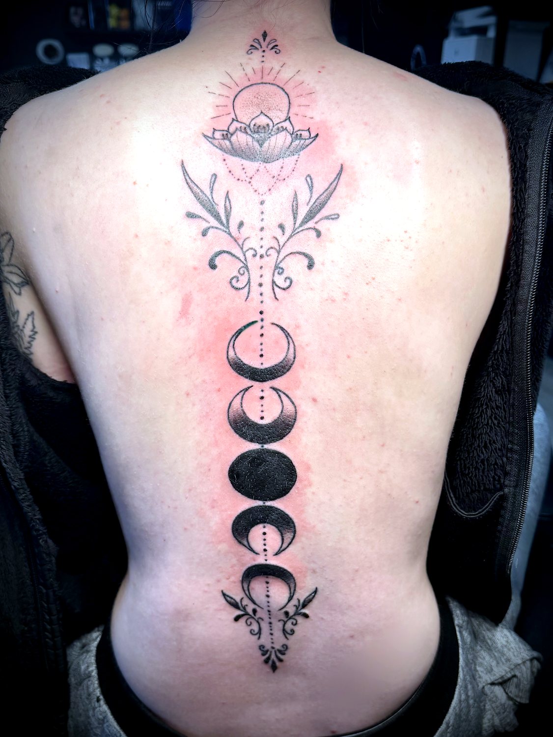 Moon Phases Spine tattoo — House of Jackalope, Mansfield OH