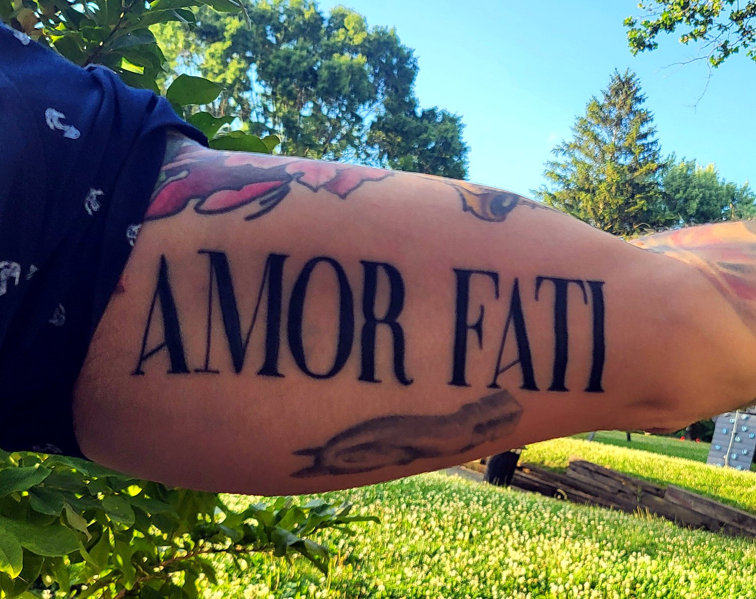 “Amor Fati” Lettering tattoo — House of Jackalope, Mansfield OH